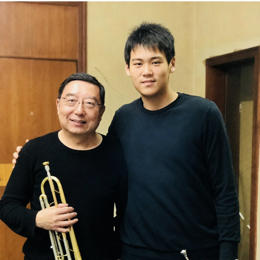 Adam Zhang with his conductor after a rehearsal