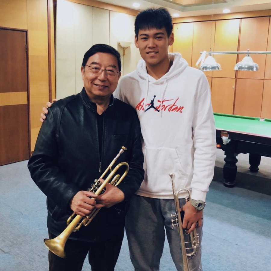 Adam Zhang with his trumpet teacher