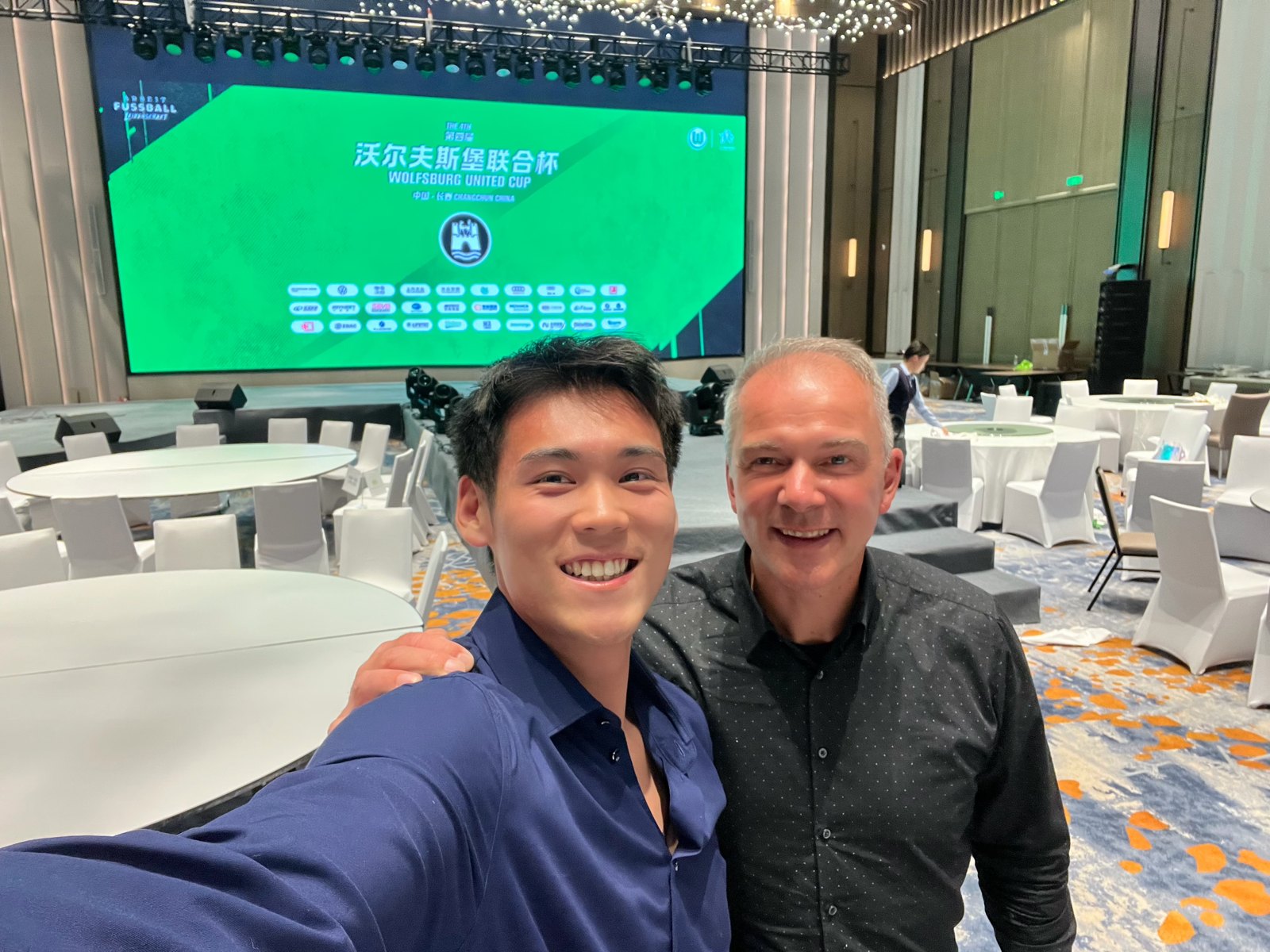 Adam Zhang with the global sales chief of VfL Wolfsburg at the 4th United Cup
